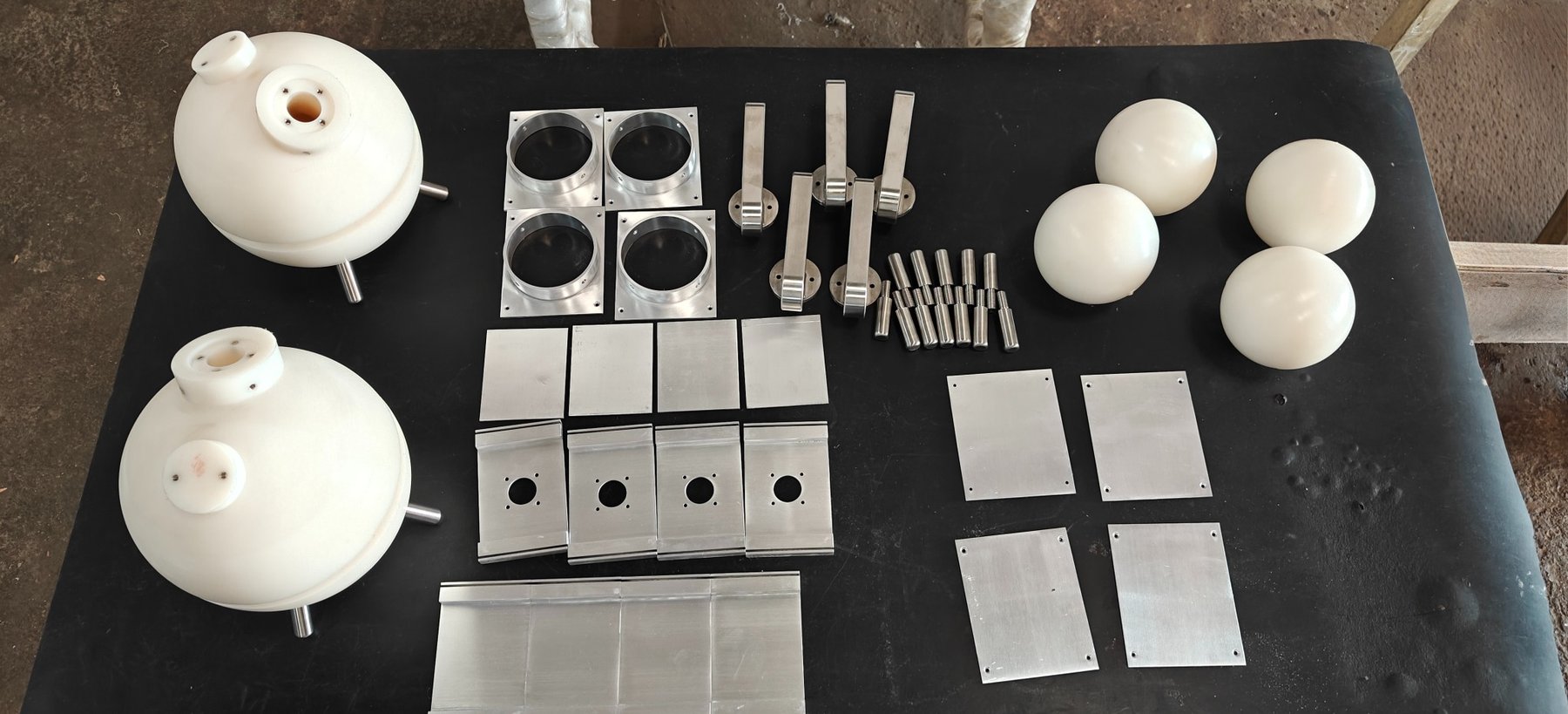 Mixed metal and polymer manufactured components